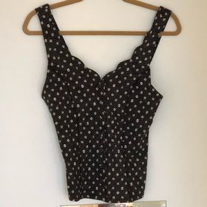 Adorable sleeveless top with scalloped details